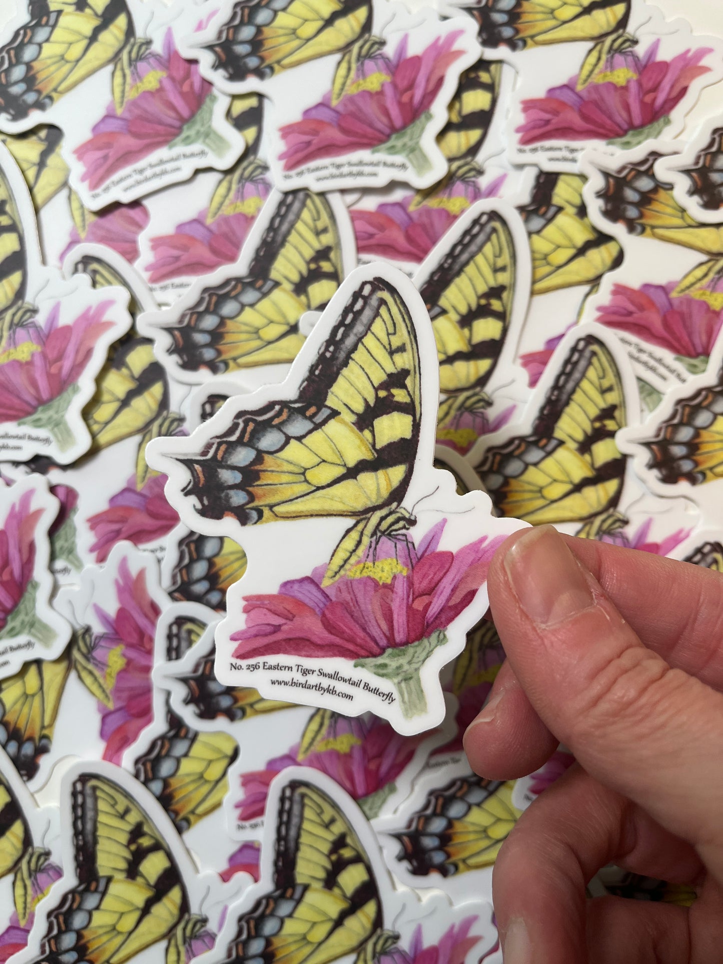 Sticker of the eastern tiger swallowtail butterfly with yellow and black patterned wings artwork.