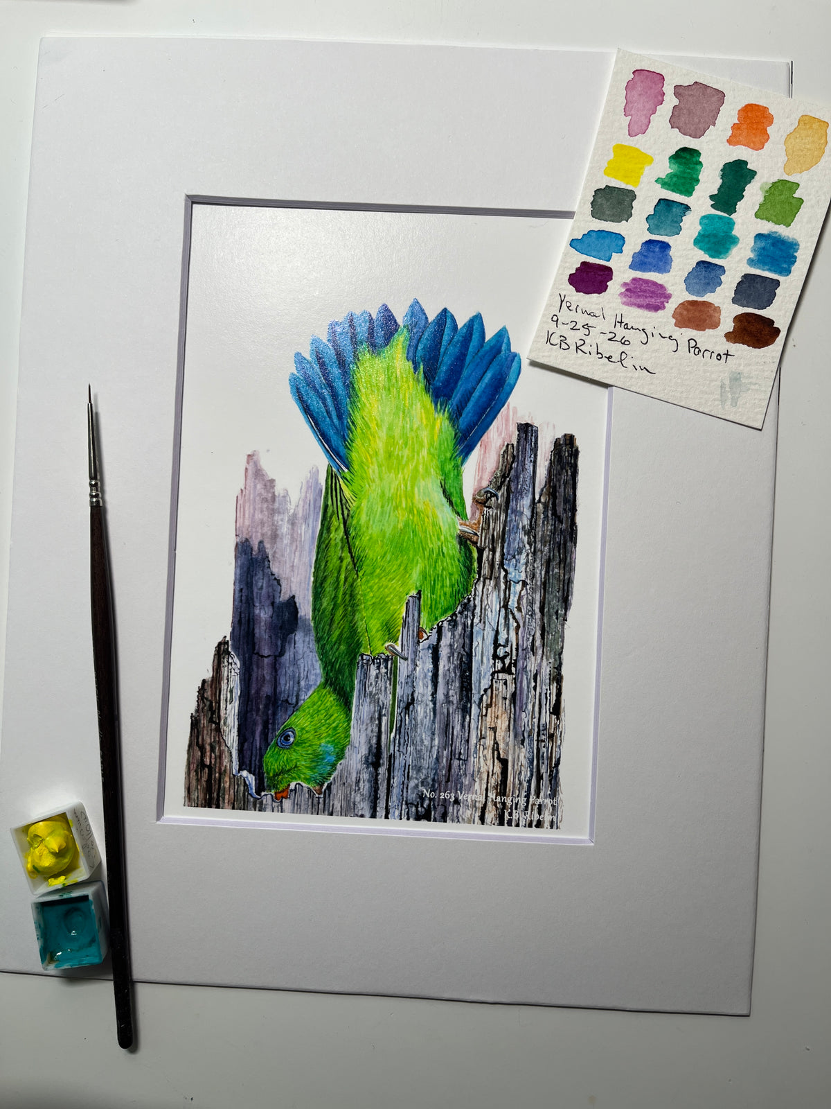 Giclee print of a two oriental turtle doves perched together touching beaks displayed in a white mat.