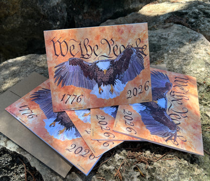 bald eagle flying forward over parchment background with “we the people” lettering